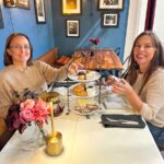 two women having tea