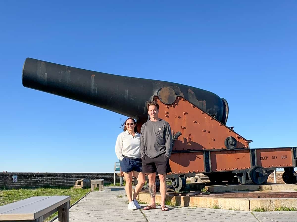 Fort Pickens cannon with people in front
