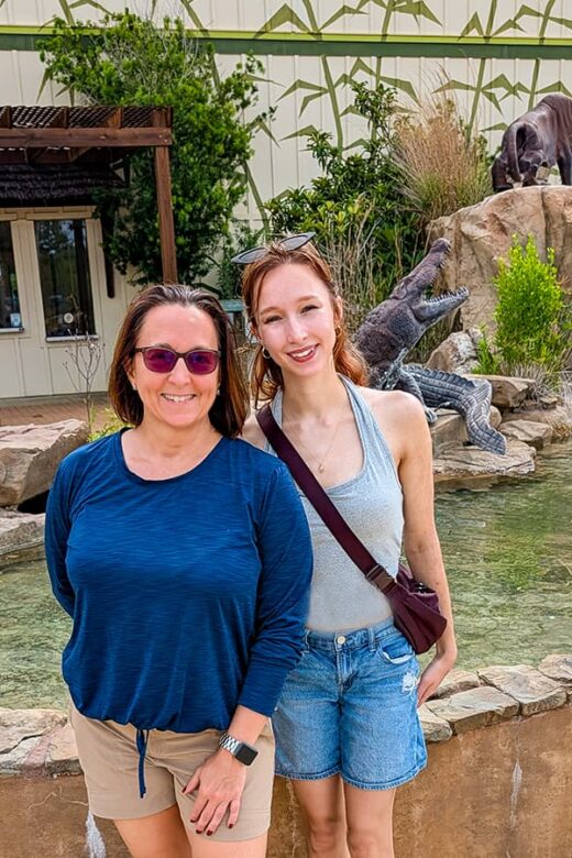 two women in front of a fountain at Alabama Coast Zoo