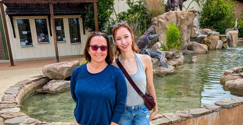 two women in front of a fountain at Alabama Coast Zoo
