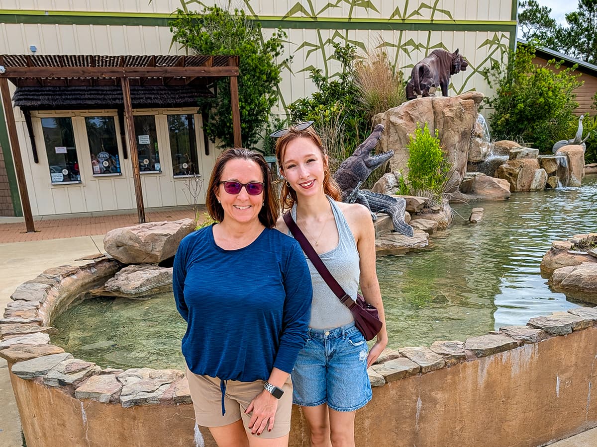 two women in front of a fountain at Alabama Coast Zoo