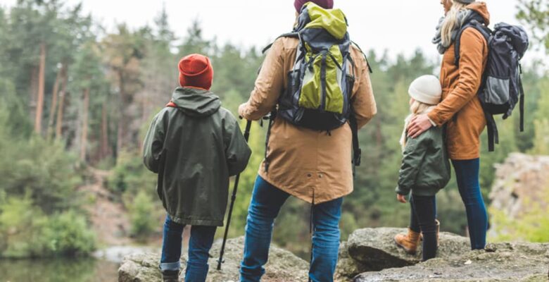 family hiking in woods