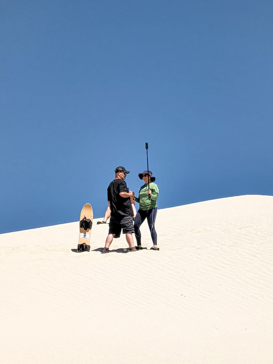 getting ready to try sandsurfing