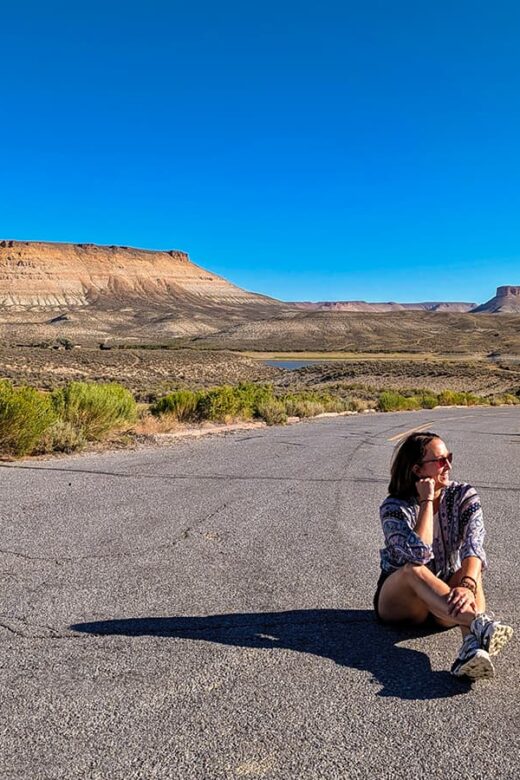 woman sitting in the road