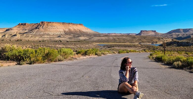 woman sitting in the road