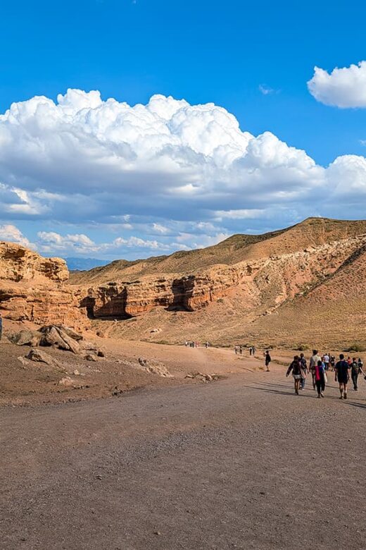 Charyn Canyon Valley of Castles - people walking into the canyon