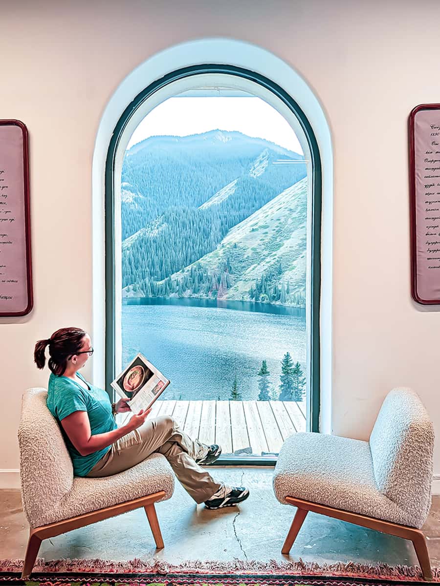 Kolsai Lake scenic seating area overlooking water