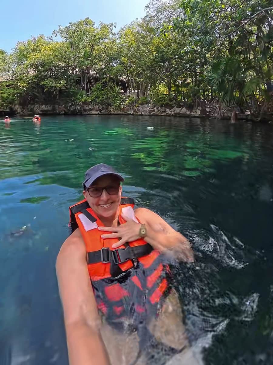 Woman in Cenote at Sandos Caracol Eco Resort