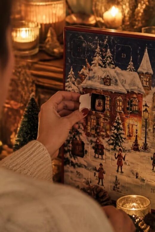 woman opening advent calendar box