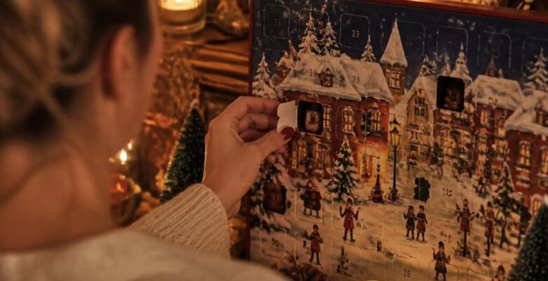 woman opening advent calendar box