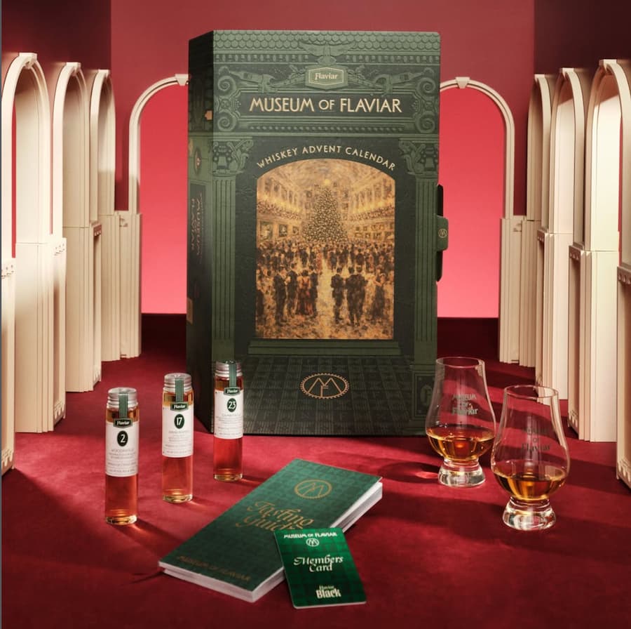 whiskey in glasse and bottles in fonrt of whiskey gift idea for adults