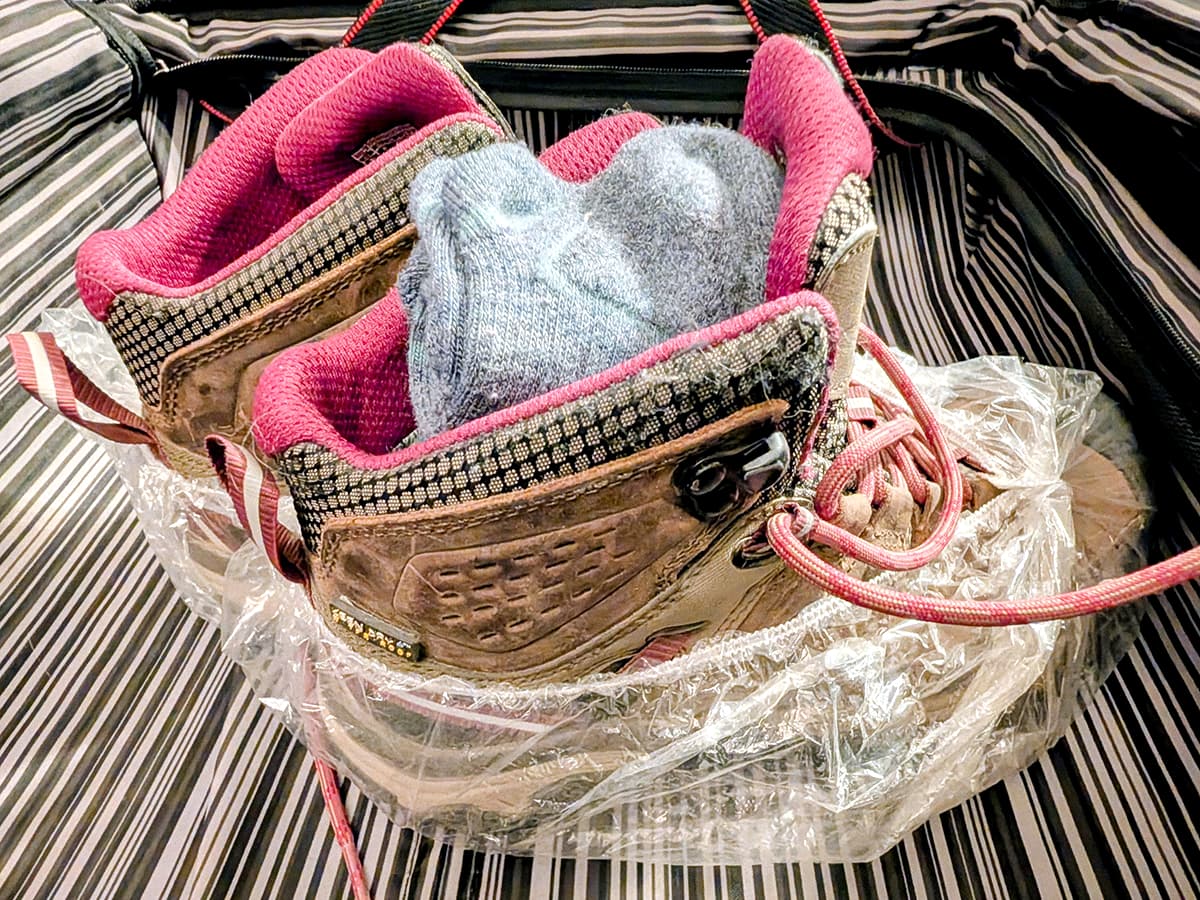socks packed in hiking boots